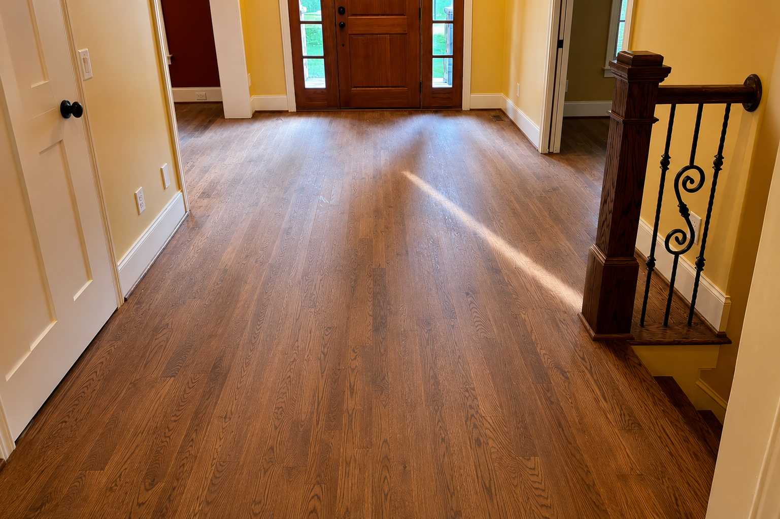 Apex hardwood floor foyer before screen and recoat