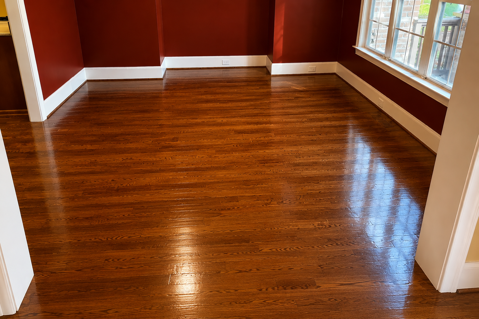 Apex hardwood floor red room after screen and recoat