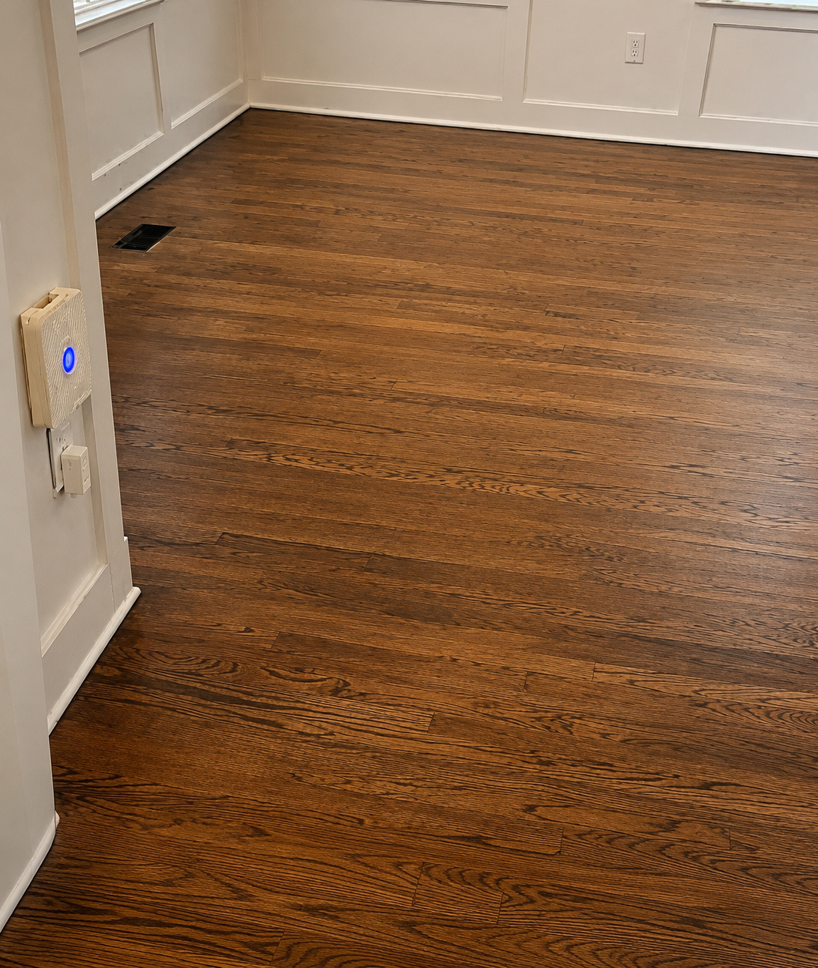 Durham hardwood floors viewed from doorway after professional Clean and Buff