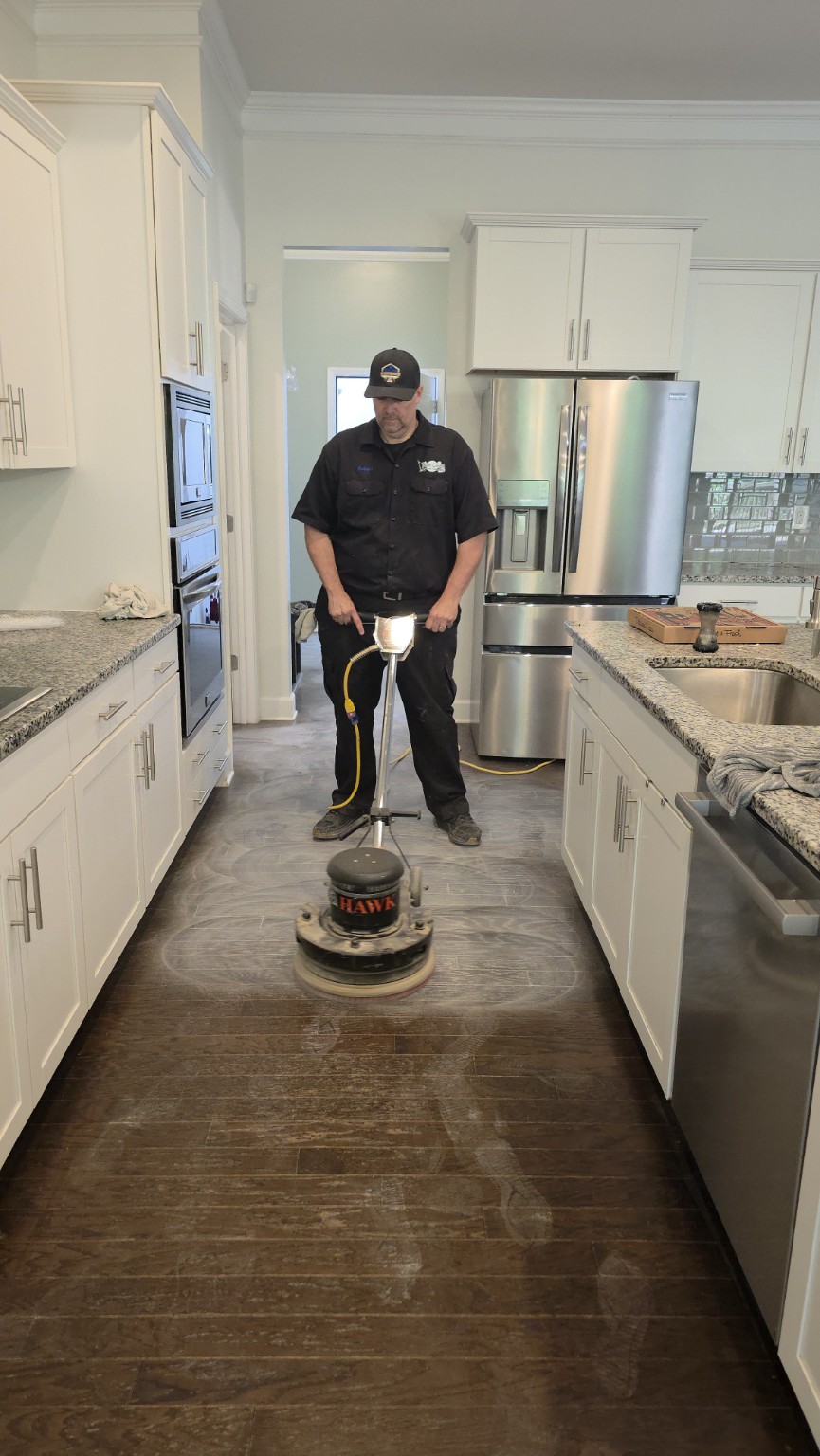 True Clean screening the hardwood floor through the kitchen