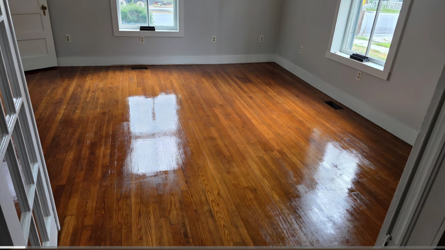 Hardwood floor before and after restoration