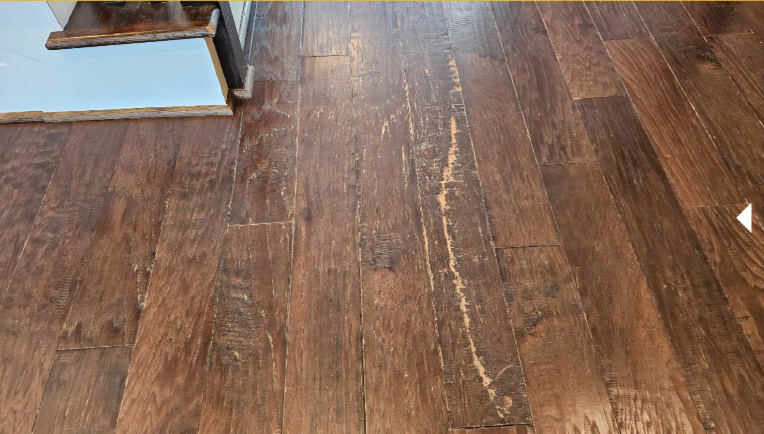 Hardwood medallion before restoration
