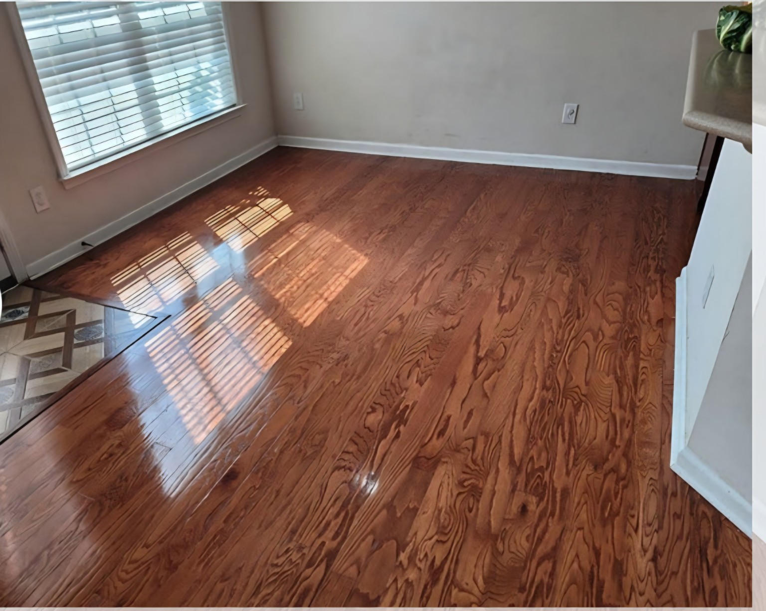 After — Dining area hardwood restoration