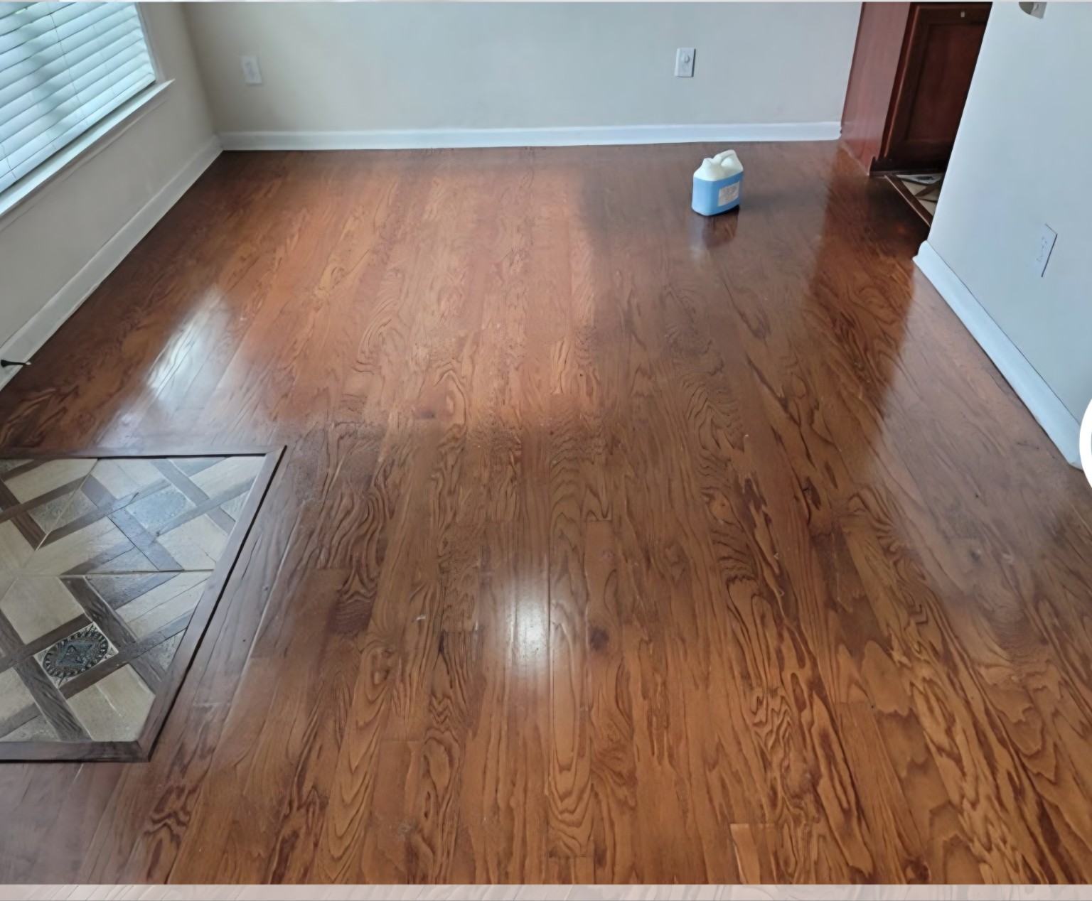 Before — Dining area hardwood restoration